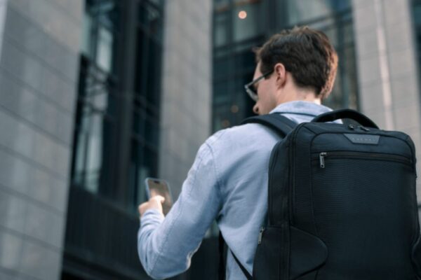 A Man Carrying a Back Pack